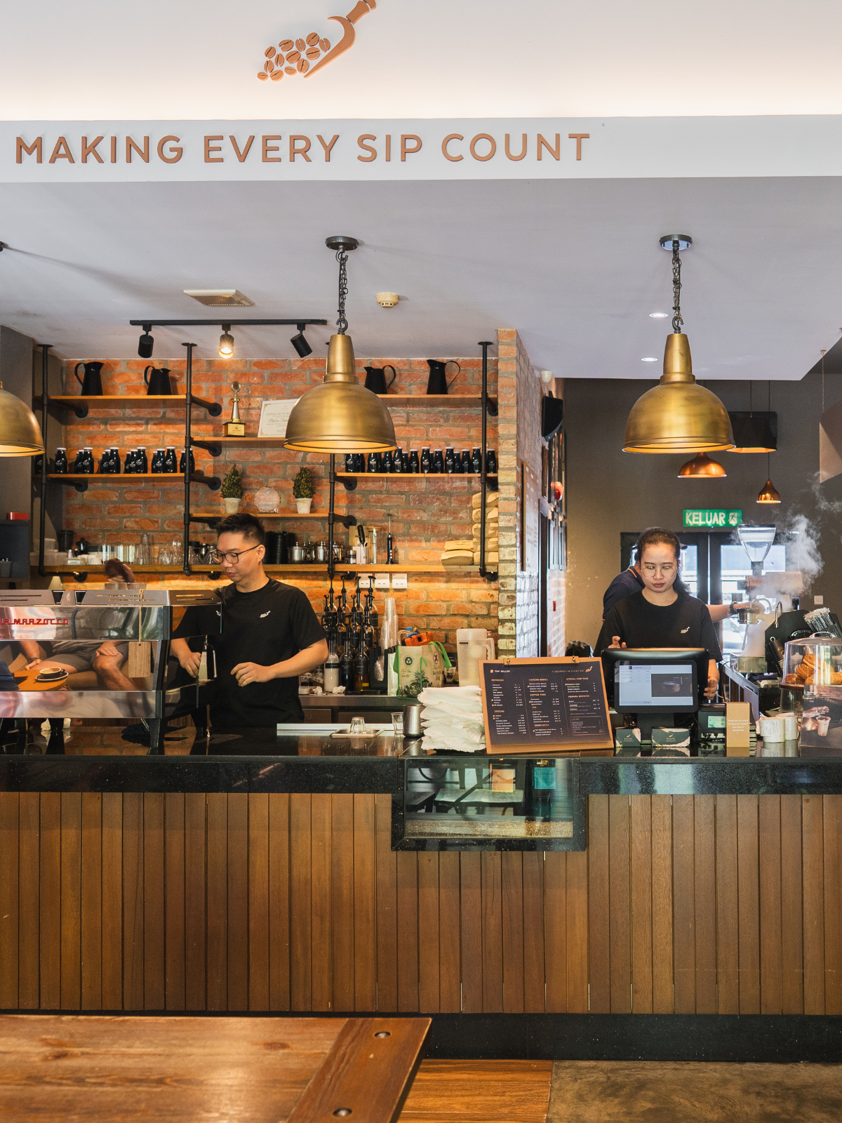Roasted Sip Serusop — Making Every Sip Count, espresso bar with brass pendants